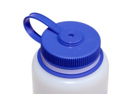 Close-up of the blue screw-on lid with loop handle on a 48oz Wide Mouth Ultralite Bottle, attached to the white bottle.
