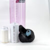 The 48oz Epic Filter Cap + Kit parts and a black lid displayed in front of a tall pink bottle on a white surface.