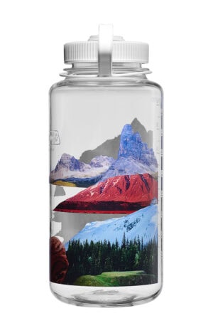 The 32oz Wide Mouth Surrealist Bottle features mountain, forest, and landscape illustrations printed on its clear side.